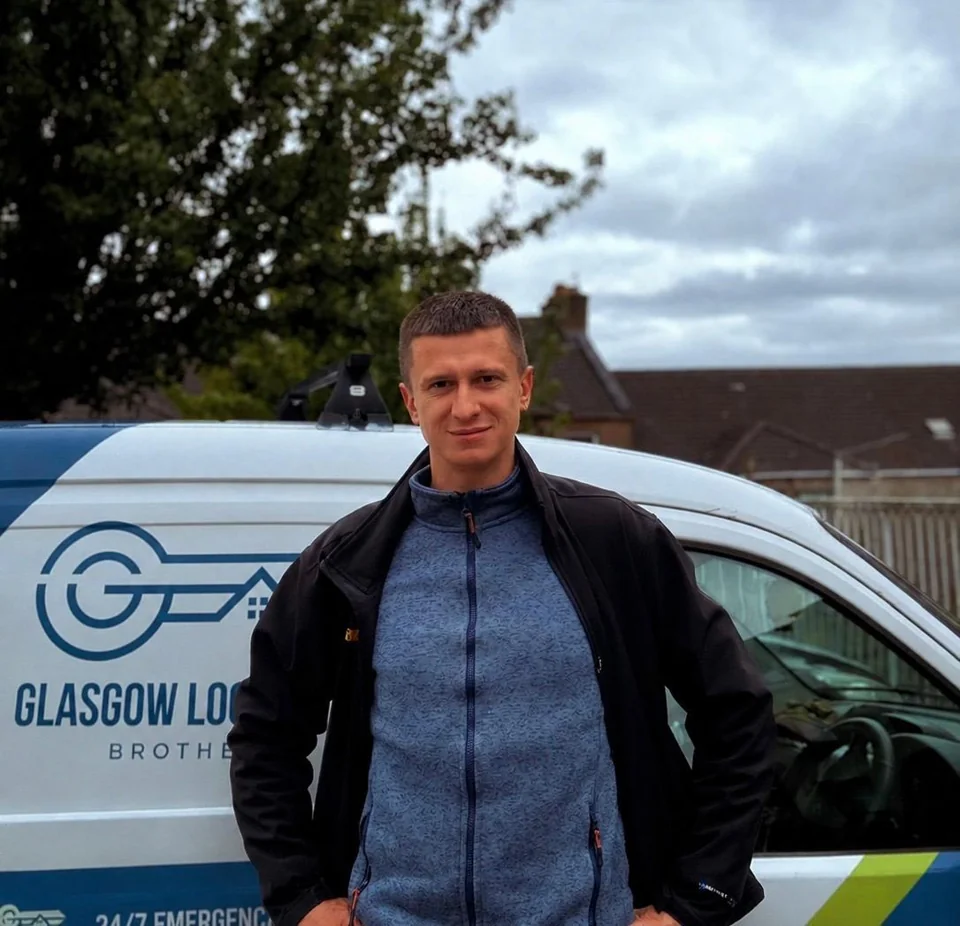 A local locksmith beside the Glasgow Locksmith Brothers branded van